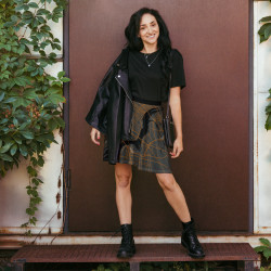 Custom Map Skirt featuring a dark gray and copper street map design, styled with a black top, jacket, and boots.