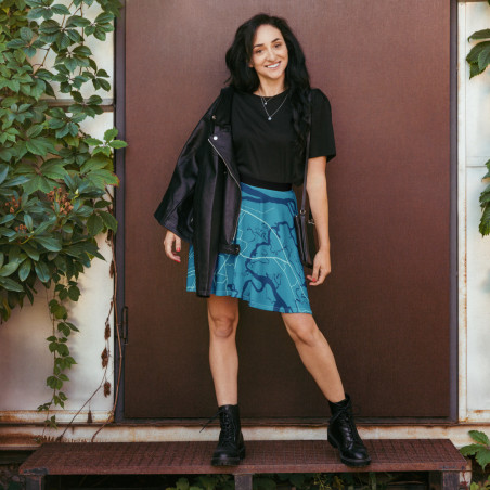Custom Map Skirt featuring a teal coastal map design, styled with a black top, jacket, and boots.