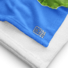 Close-up of a custom Map Beach Towel showing the printed blue map design, soft towel texture, stitched edge, and MapStuff logo.
