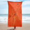 Custom orange Map Beach Towel featuring an Albuquerque map design with a teal location marker, shown held up at the beach.