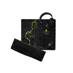 Custom black map gaming mouse pad featuring a neon green Bend, Oregon map design, styled with a keyboard, mouse, and headset.
