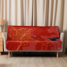Custom red Map Blanket featuring a Las Vegas map design with a blue location marker, draped across a living room couch.
