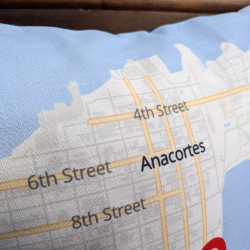 Close-up of a custom map pillow showing the printed fabric texture and Anacortes map details.