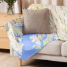 Custom Map Blanket featuring a light-colored road map design, draped over a couch with a neutral throw pillow.